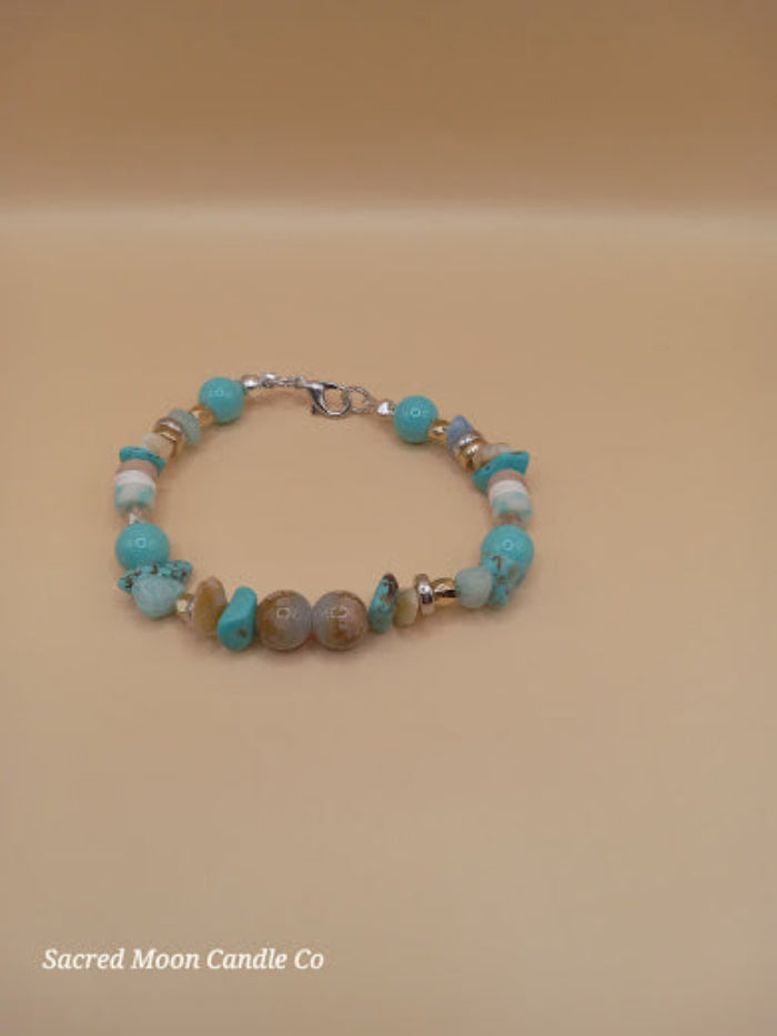 Bohemian beach crystal bracelet stack by Sacred Moon Candle Co with turquoise and natural stone beads