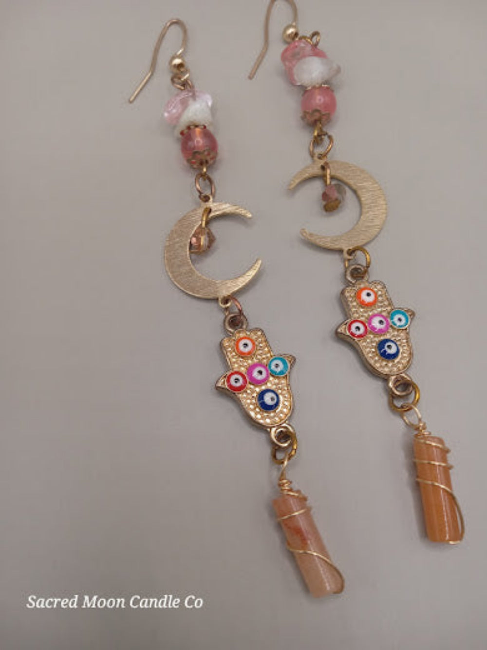 Sacred Moon Candle Co crescent moon hamsa earrings wire wrapped peach aventurine dangle jewelry