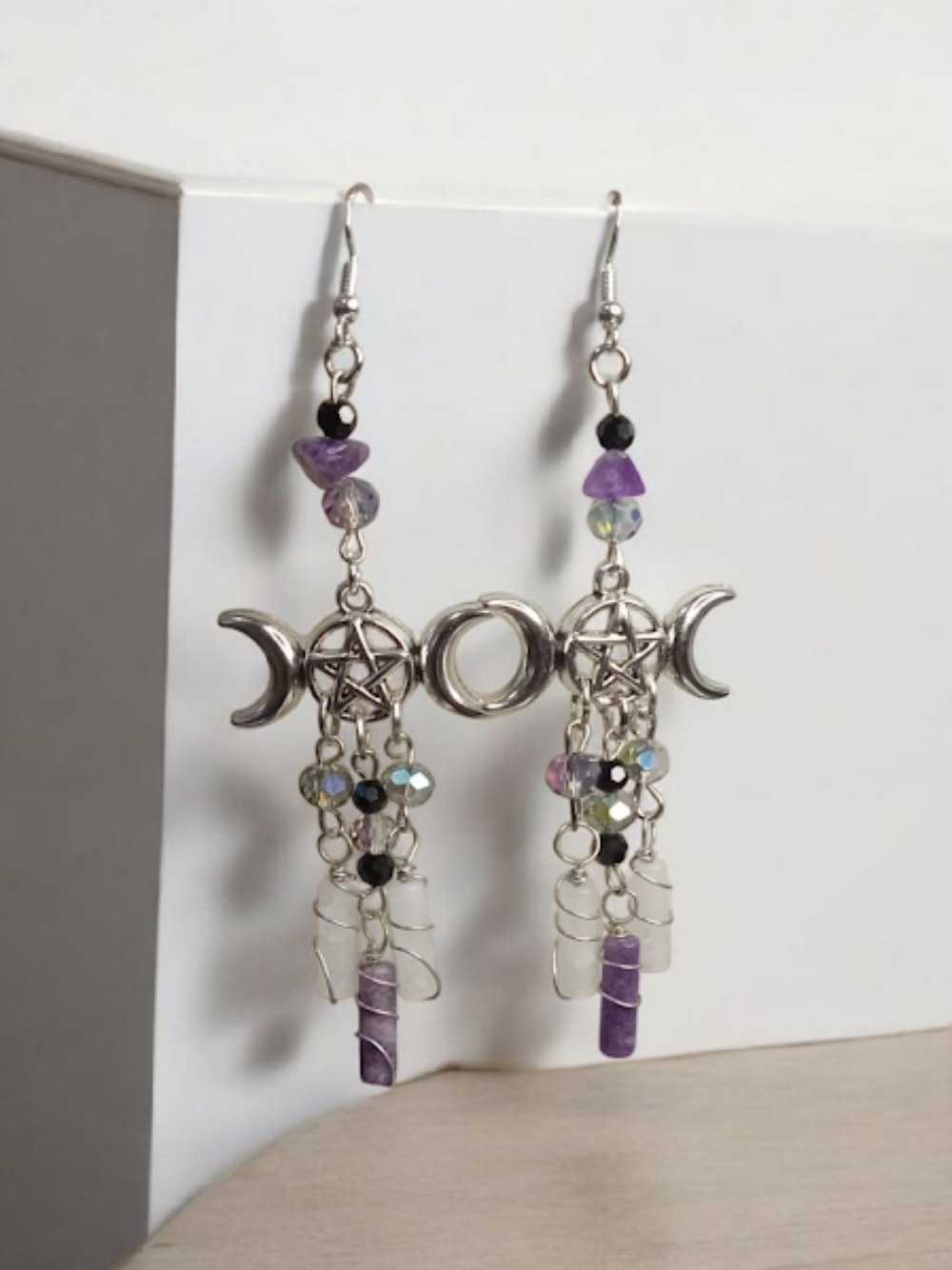 Sacred Moon Candle Co triple moon goddess earrings with silver pentacles and purple gemstone accents