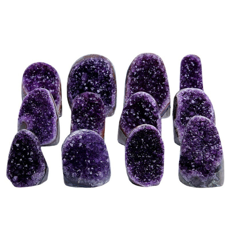 Sacred Moon Candle Co amethyst quartz cluster for energy healing set of polished purple geode specimens on white background