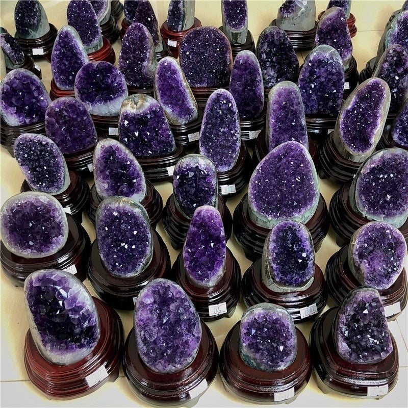 Sacred Moon Candle Co amethyst quartz cluster for energy healing display of multiple purple geode stands