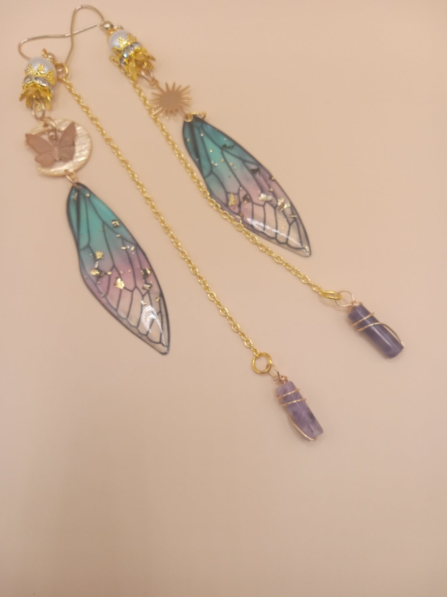 Sacred Moon Candle Co blue and violet fairy earrings with gold chains moon sun charms and amethyst dangles