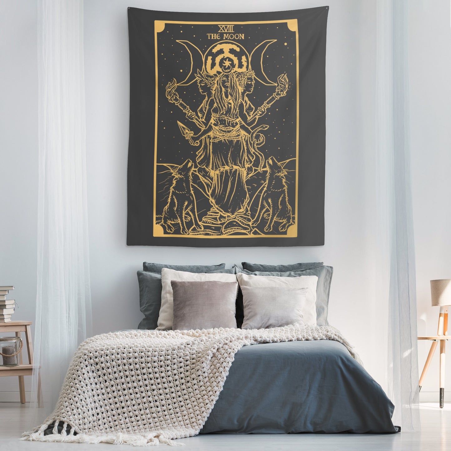 Triple Moon Goddess Hekate Tapestry hanging above bed in modern bedroom dark gray with gold tarot style design