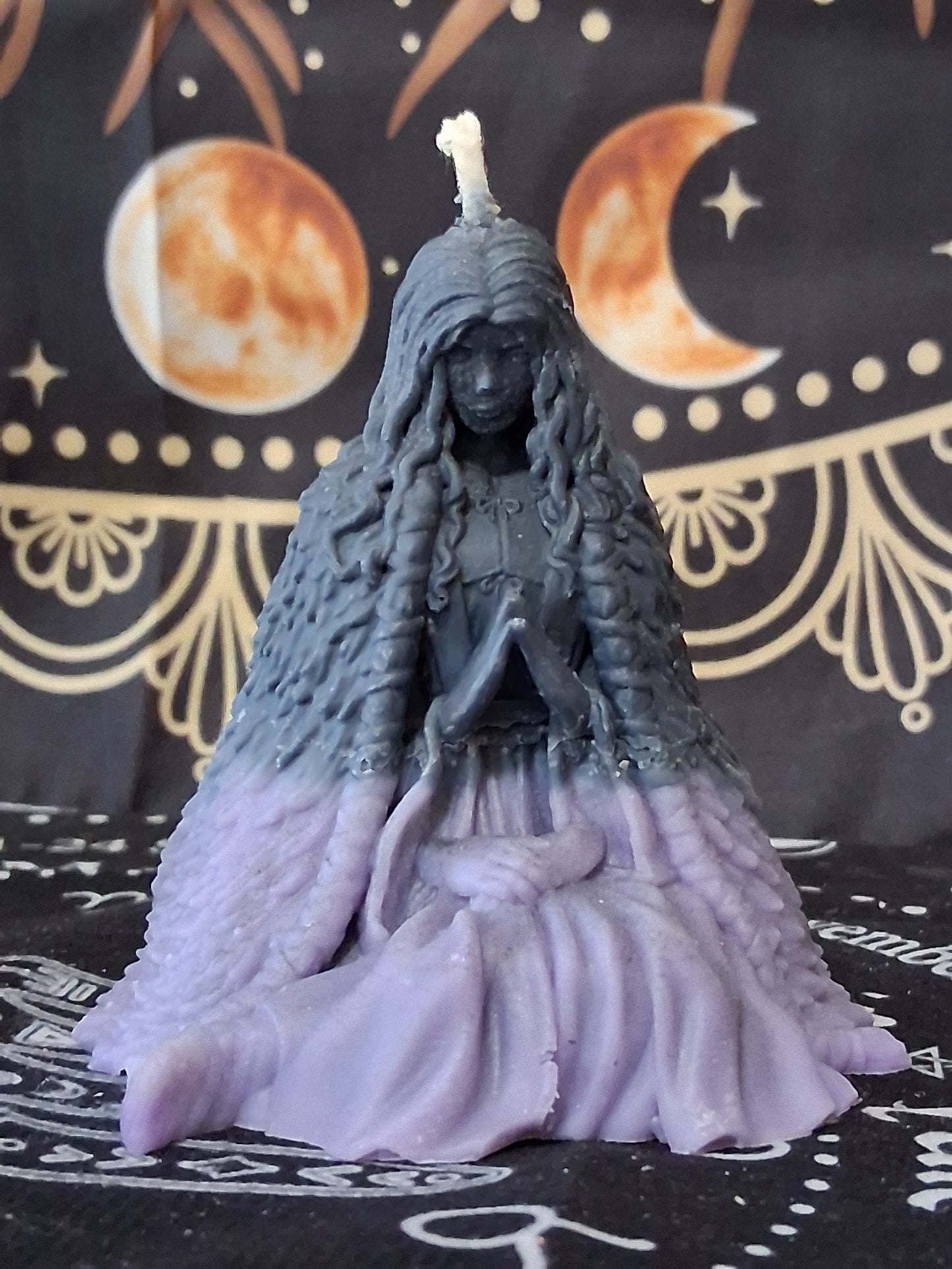 Sacred Moon Candle Co moon water bloom goddess ritual candle shaped like a seated woman with flowing hair