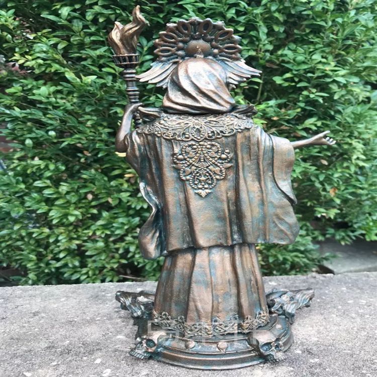 Sacred Moon Candle Co bronze Hekate goddess statue back view holding torch ornate cloak and halo for altar