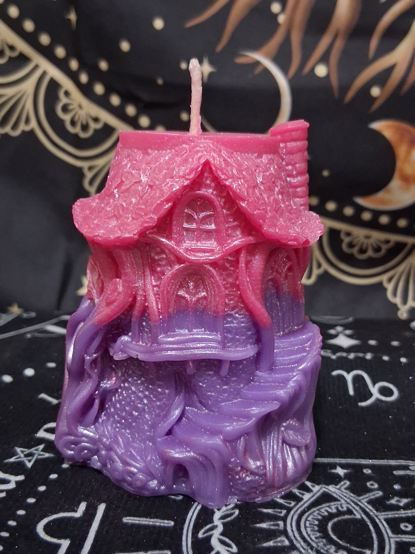 Nectar Nook Scented Treehouse Candle by Sacred Moon Candle Co with pink and purple detailed treehouse design