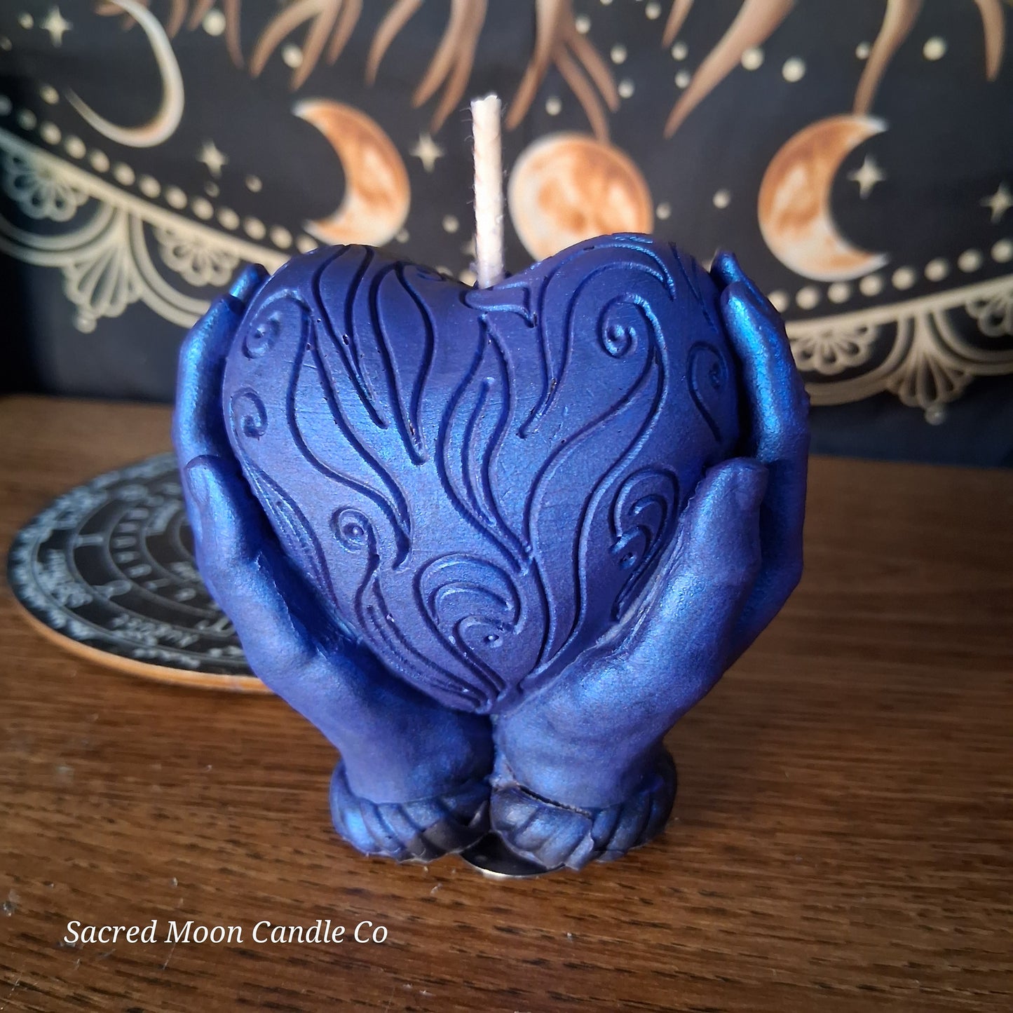 The Alchemist Embrace Saffron and Patchouli Scented Heart in Hands Candle