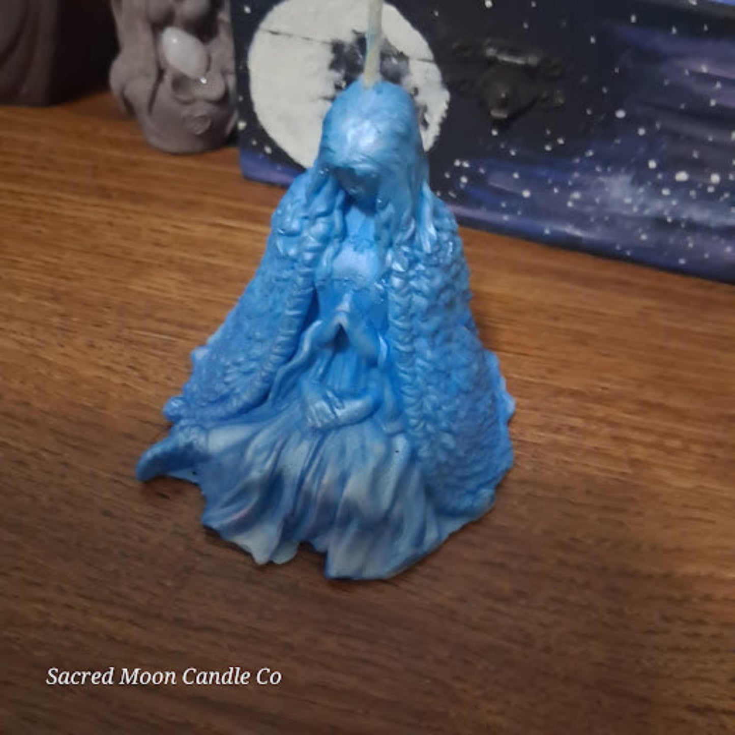 Blue Whispering Water Lily Goddess Candle 3.3oz . Sacred Moon Candle Co blue goddess figurine candle with flowing robe details