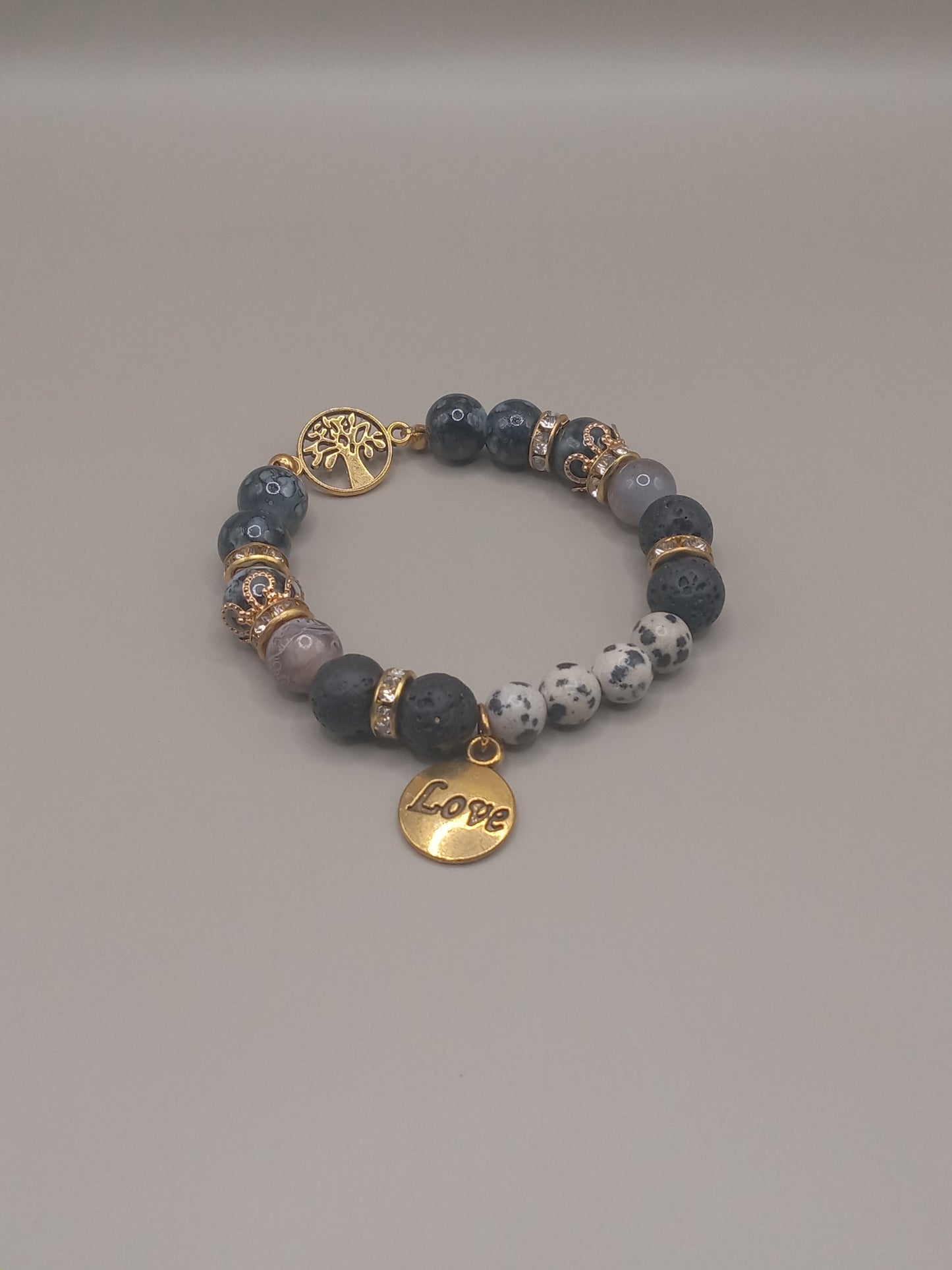One with Nature Bohemian Dalmatian Jasper Bracelet Stack by Sacred Moon Candle Co with gold tree and Love charms