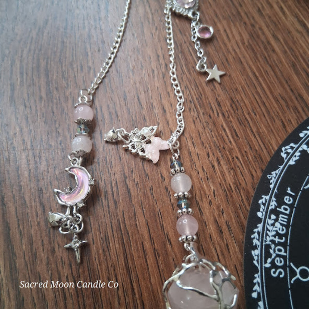 Rose quartz pendulum for divination with silver chain and crescent moon charm by Sacred Moon Candle Co