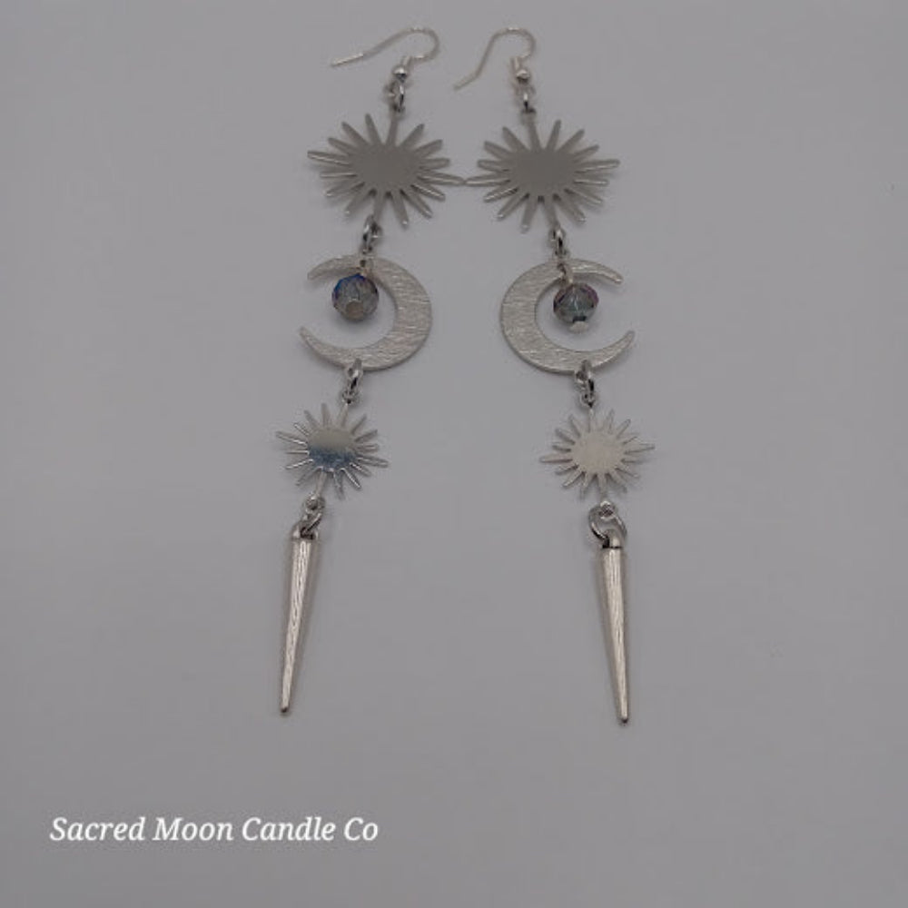 Sacred Moon Candle Co spiked moon dangle earrings with sun, crescent moon, and spike charms in silver