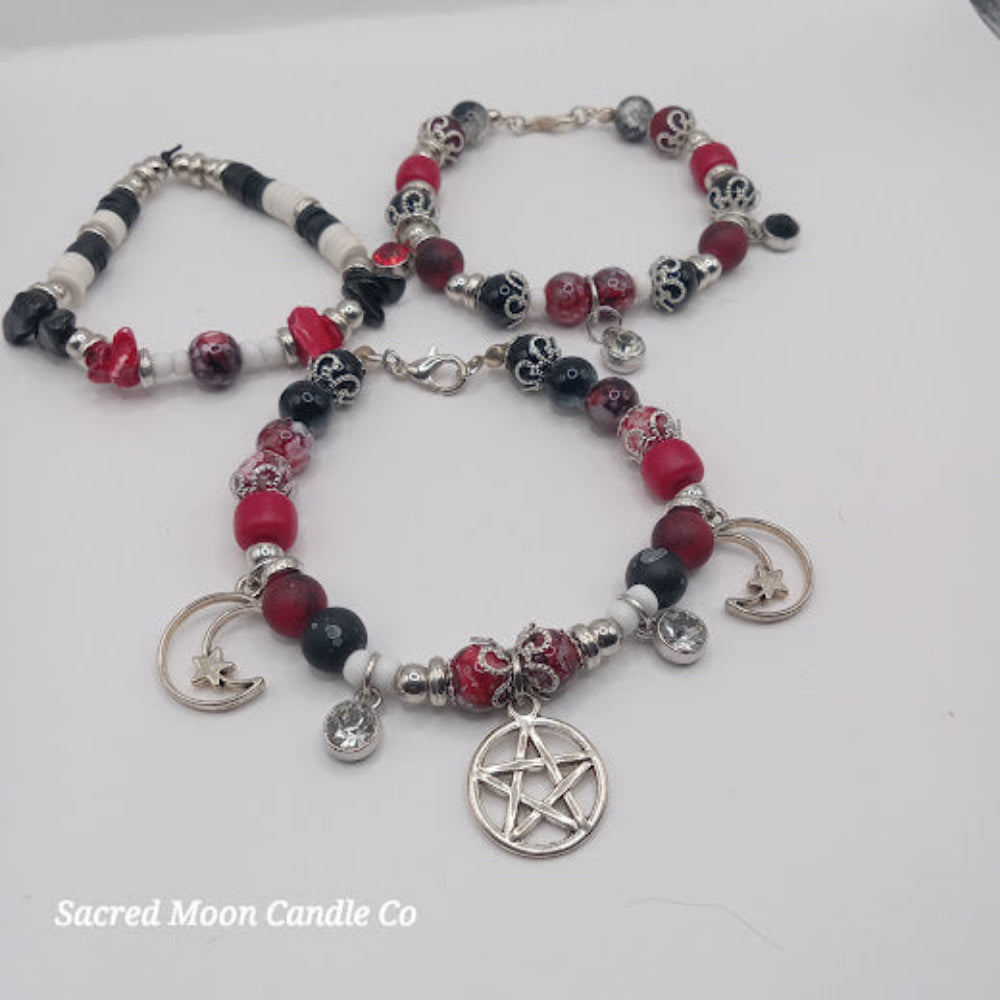 Triple Moon Goddess pentacle charm bracelet set by Sacred Moon Candle Co with red black and white beads