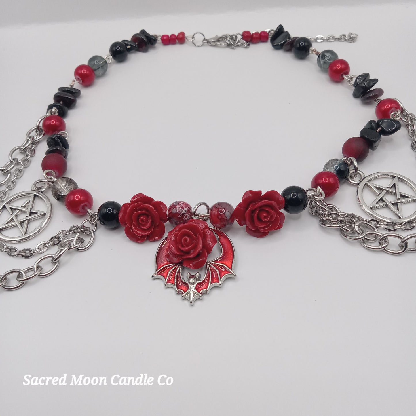 Handmade rose bat choker necklace with red roses black beads and silver pentagram charms by Sacred Moon Candle Co