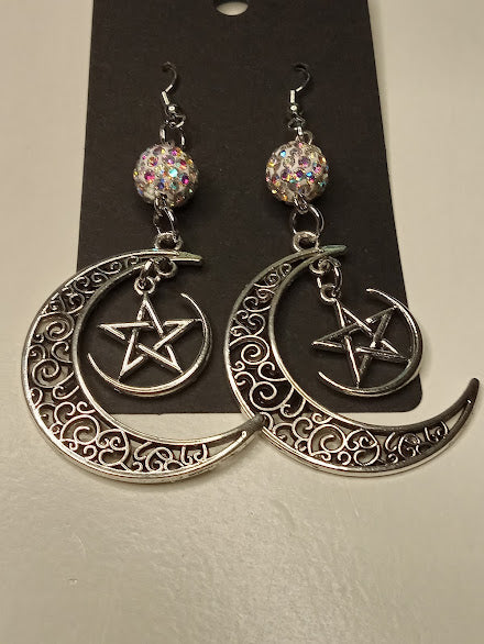 Silver witchy pentacle moon earrings with filigree crescent and sparkling bead dangles by Sacred Moon Candle Co