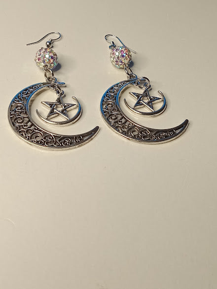 Sacred Moon Candle Co witchy pentacle moon silver earrings with crescent and star design