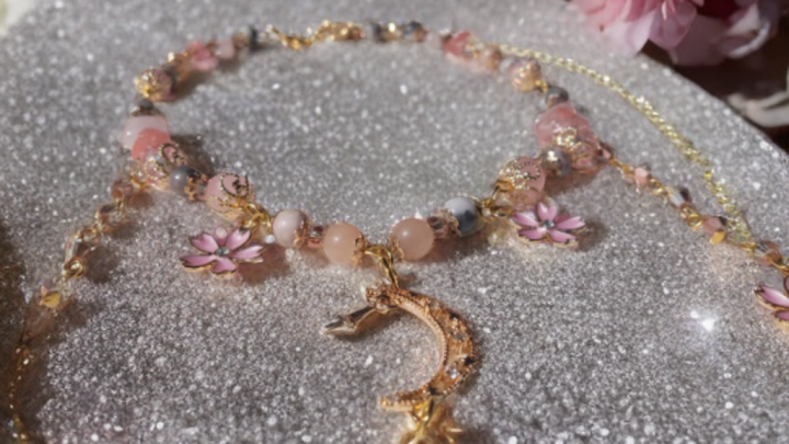 Sacred Moon Candle Co sakura blossom moon choker with pink beads and gold crescent moon pendant