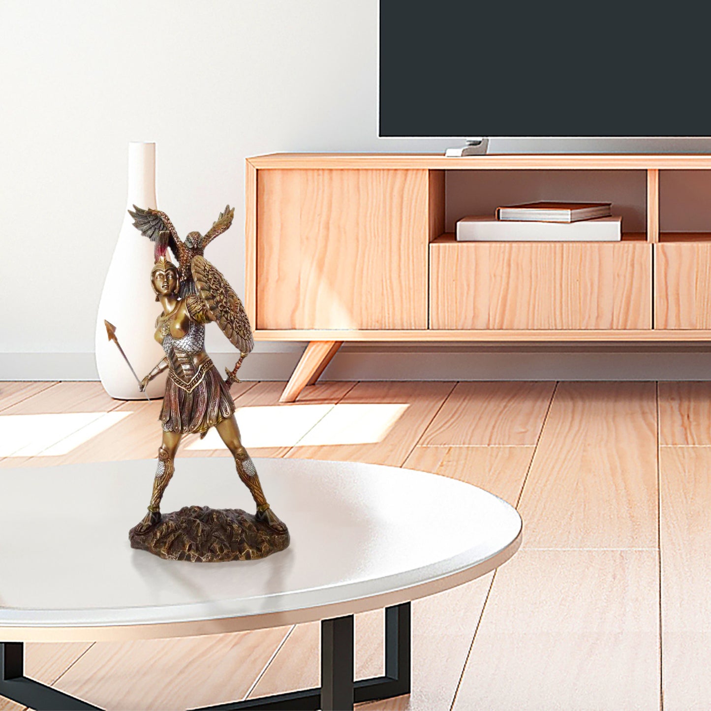 Athena goddess statue bronze altar tool on white coffee table in modern living room Sacred Moon Candle Co