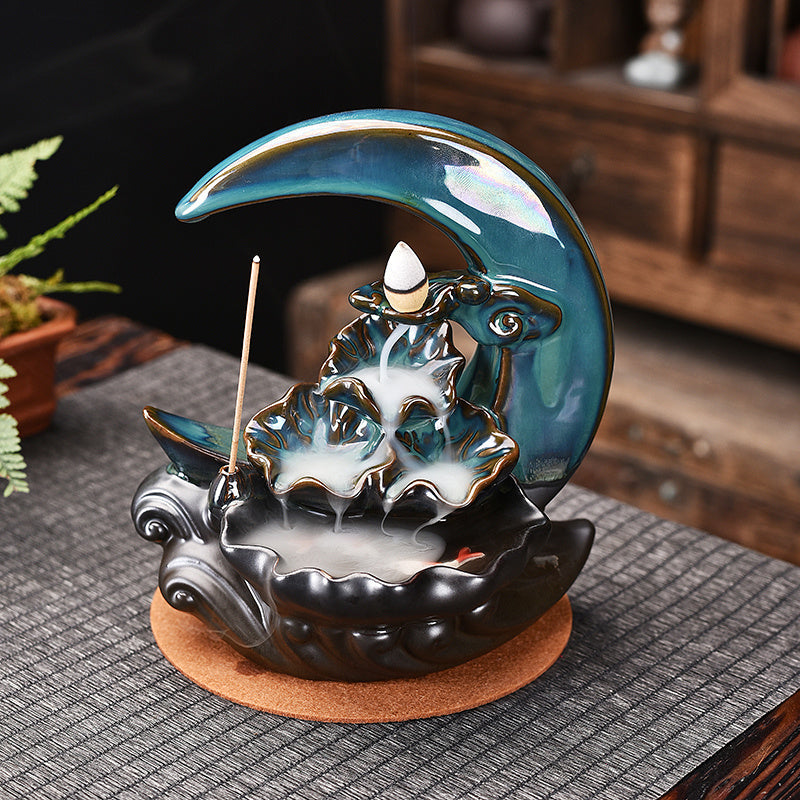 Sacred Moon Candle Co glazed teal moon backflow incense burner with cascading waterfall cones and stick holder