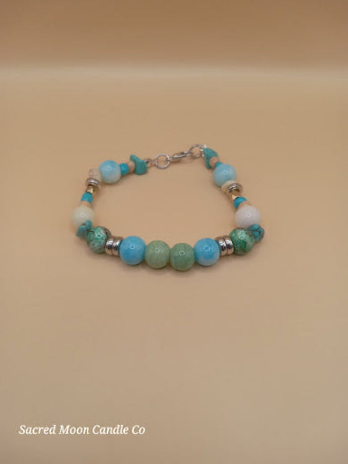 Bohemian beach crystal bracelet stack with blue and green beads by Sacred Moon Candle Co