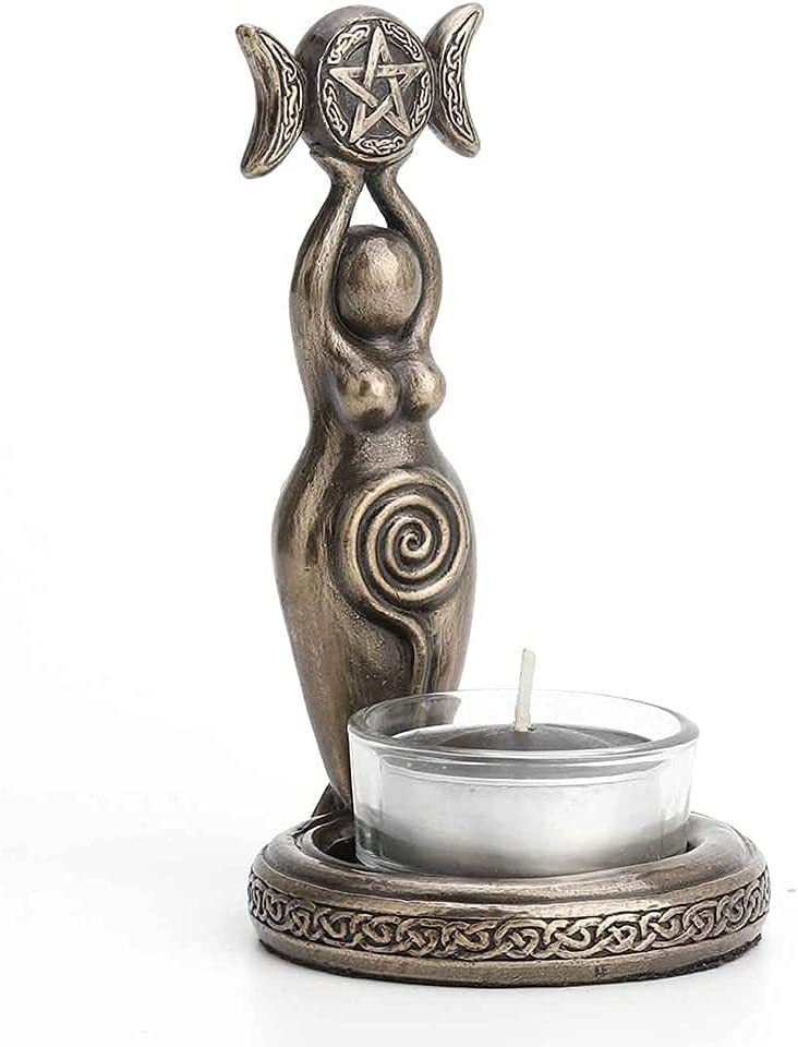 Bronze triple moon goddess tea light candle holder with pentagram and Celtic knot base holding a glass tea light