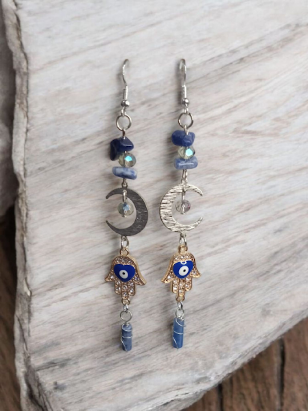 Sacred Moon Candle Co crescent moon hamsa earrings with blue beads and silver and gold charms