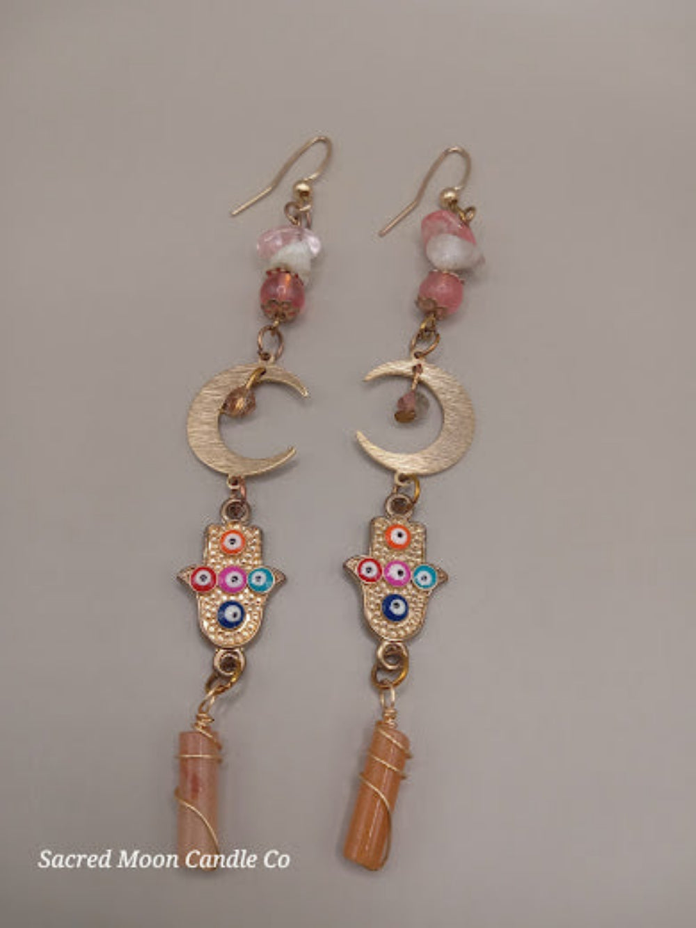 Sacred Moon Candle Co crescent moon hamsa earrings wire wrapped peach aventurine with colorful details