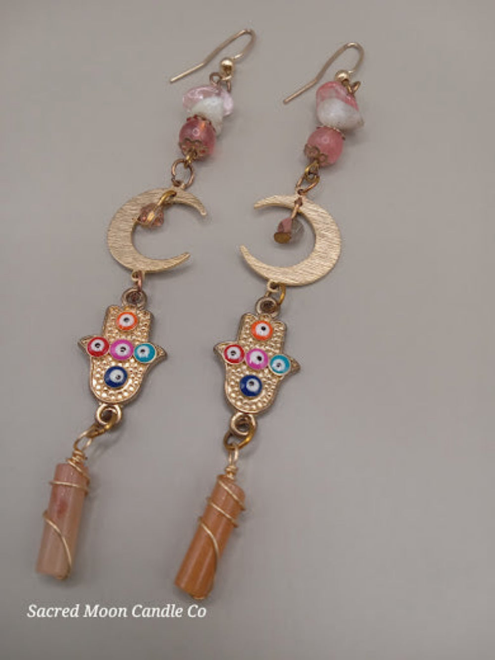 Sacred Moon Candle Co crescent moon hamsa earrings wire wrapped peach aventurine with colorful accents