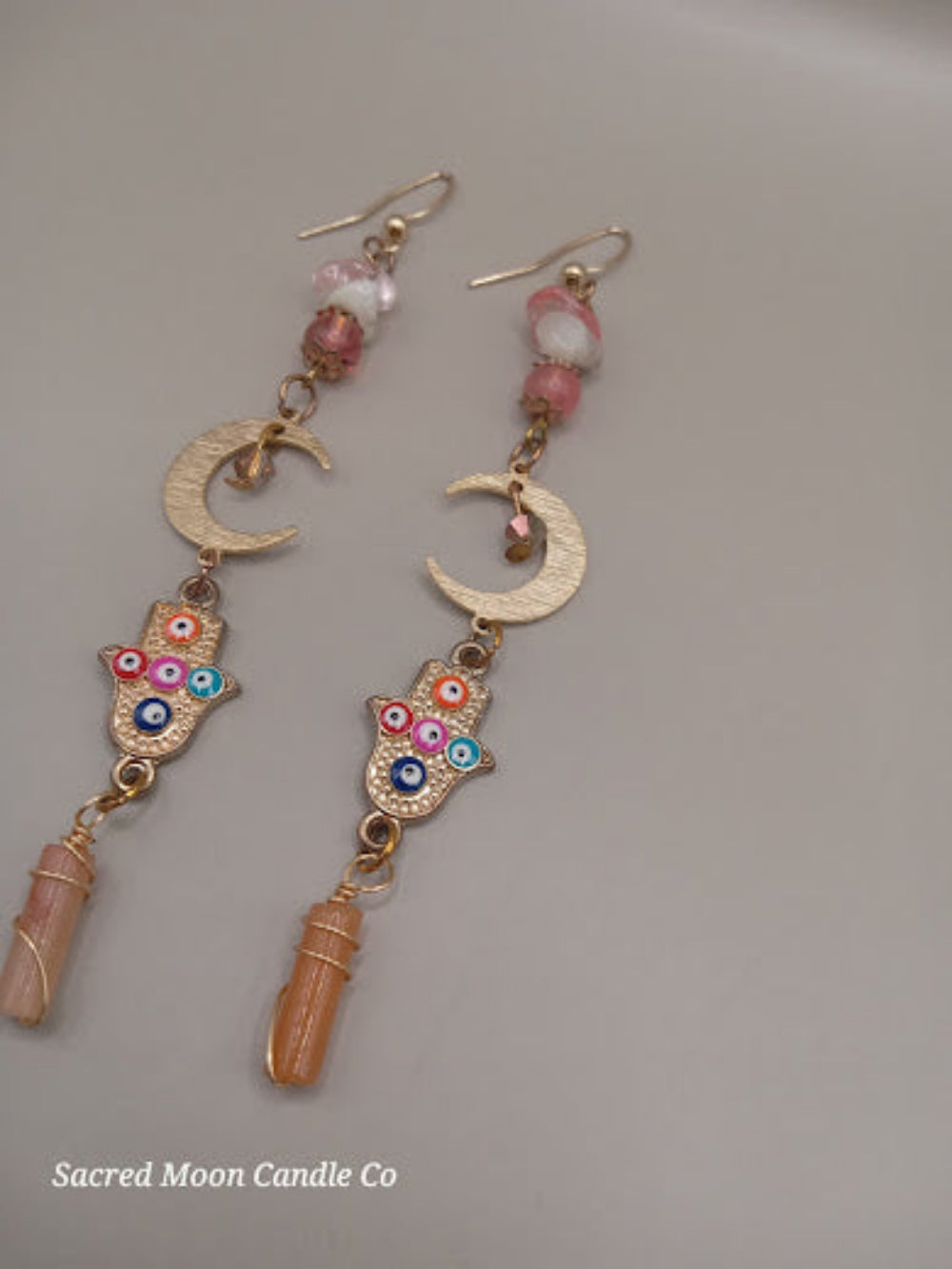 Sacred Moon Candle Co crescent moon hamsa earrings wire wrapped peach aventurine with colorful beads