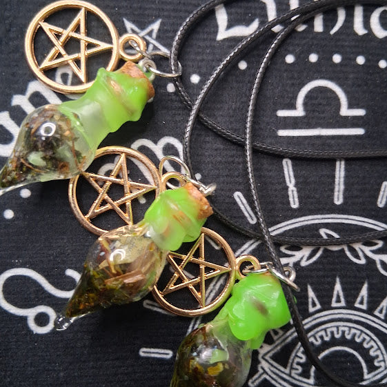 Sacred Moon Candle Co prosperity spell bottle necklace with green glass bottles and gold pentagram charms