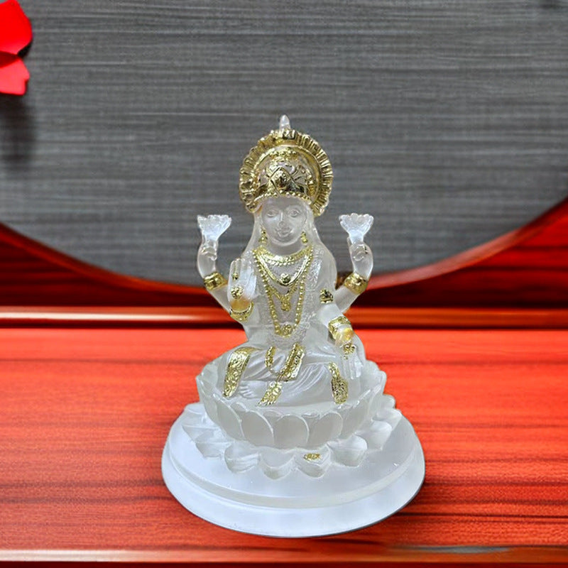 Sacred Moon Candle Co Lakshmi resin altar statue white translucent resin with gold accents seated on lotus