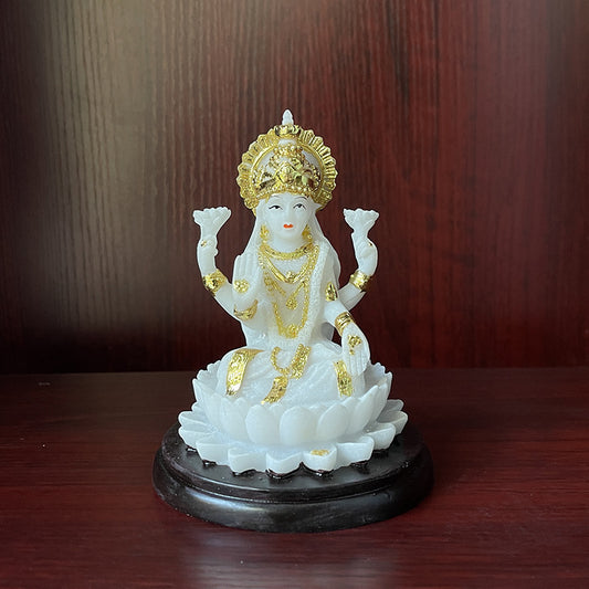 Sacred Moon Candle Co Lakshmi resin altar statue white resin goddess seated on lotus with gold accents on wooden base