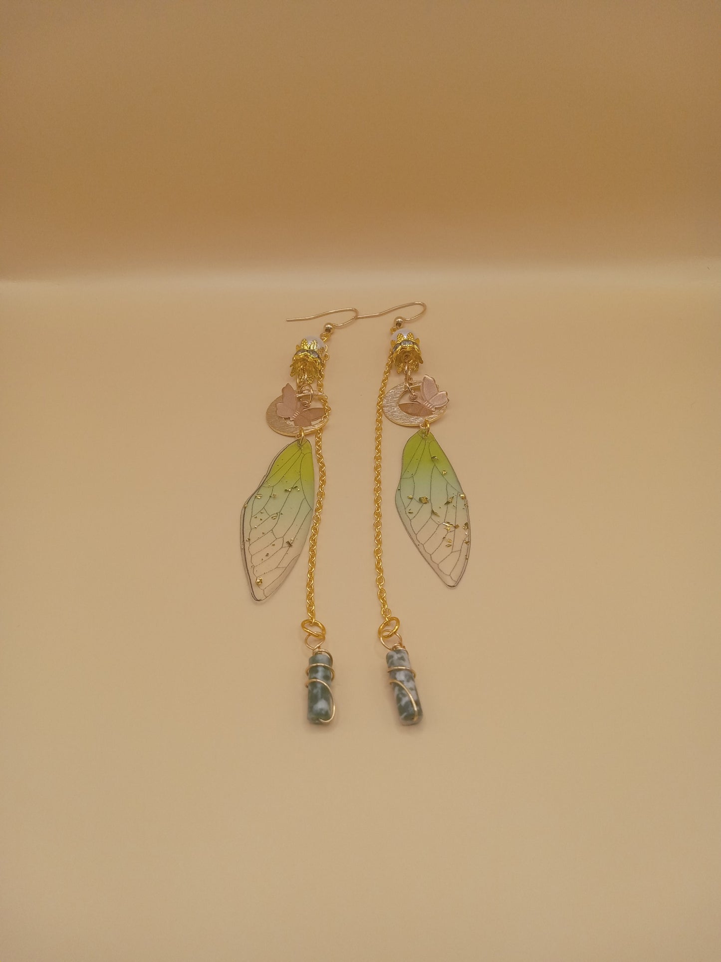Sacred Moon Candle Co green fairy wing dangle earrings with gold chains pink rose charms and bead drops