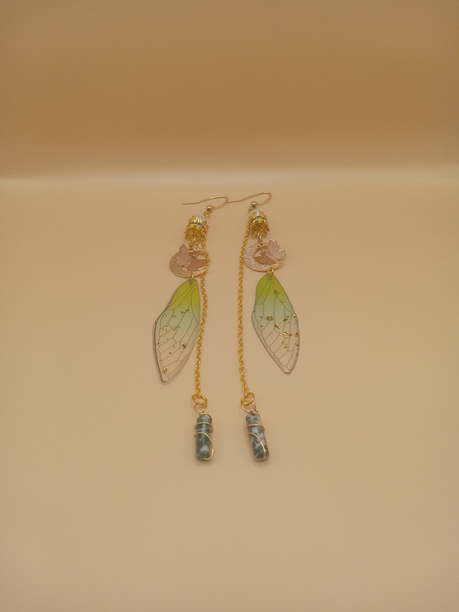 Sacred Moon Candle Co green fairy wing dangle earrings with gold chains pink rose charms and bead drops