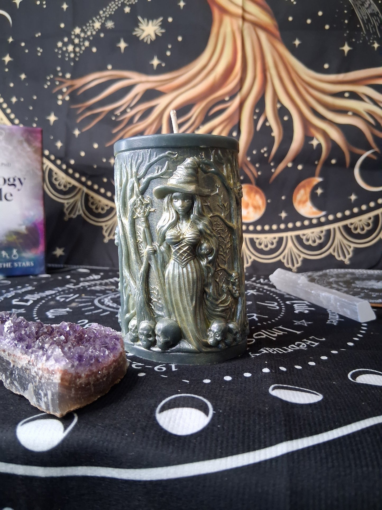 Sacred Moon Candle Co forest witch ritual candle with witch and skull design on black background