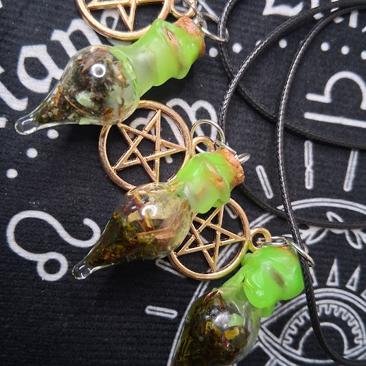 Prosperity spell bottle necklace with green capped glass vial and pentagram charm by Sacred Moon Candle Co