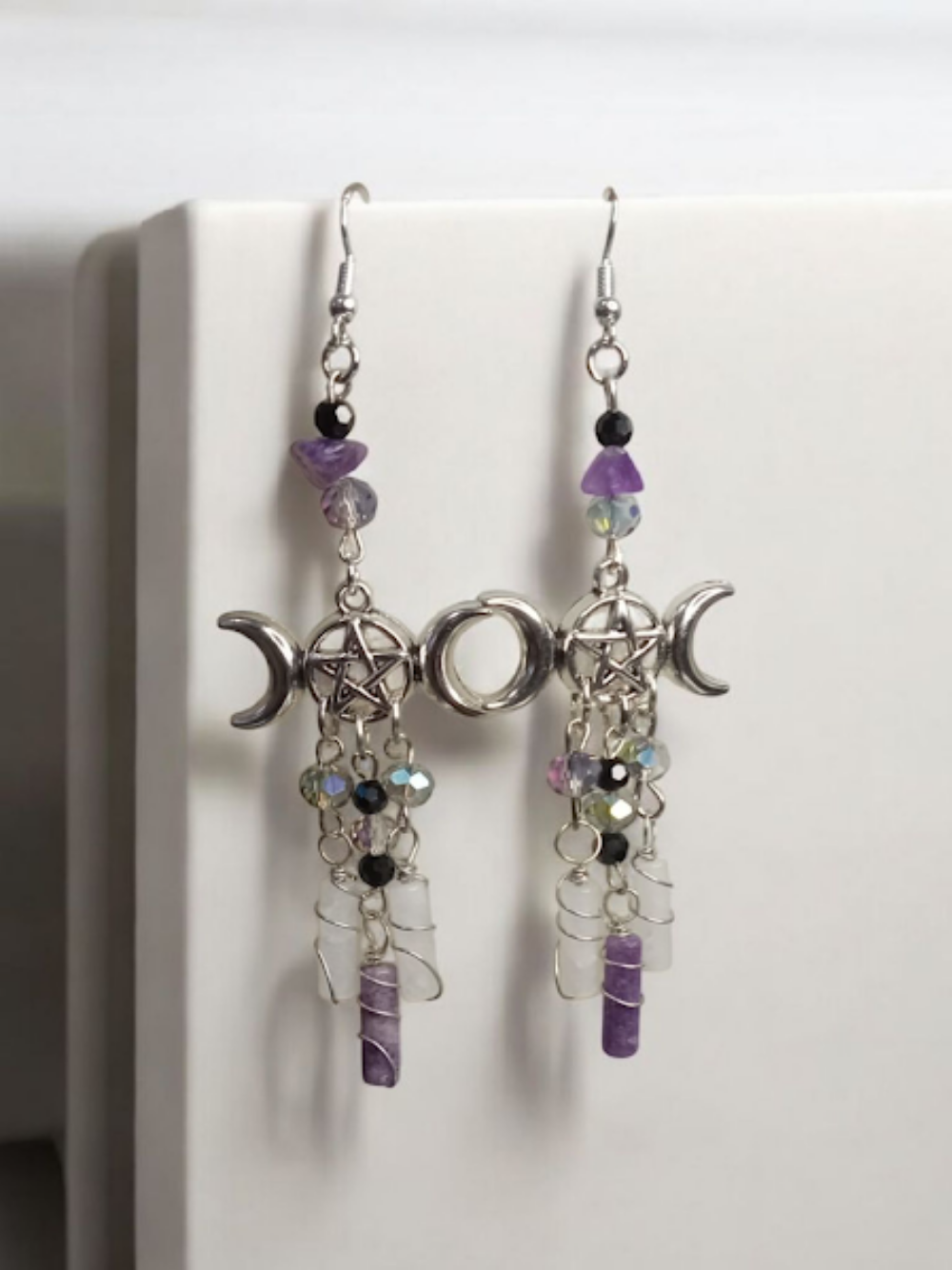 Sacred Moon Candle Co silver triple moon goddess earrings with pentacle charms and purple bead accents