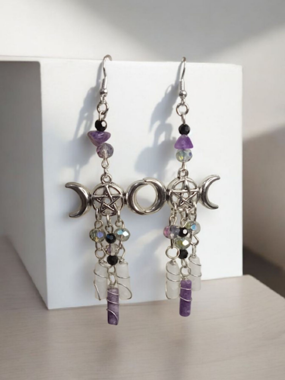 Sacred Moon Candle Co triple moon goddess earrings with pentacle charms and purple beads
