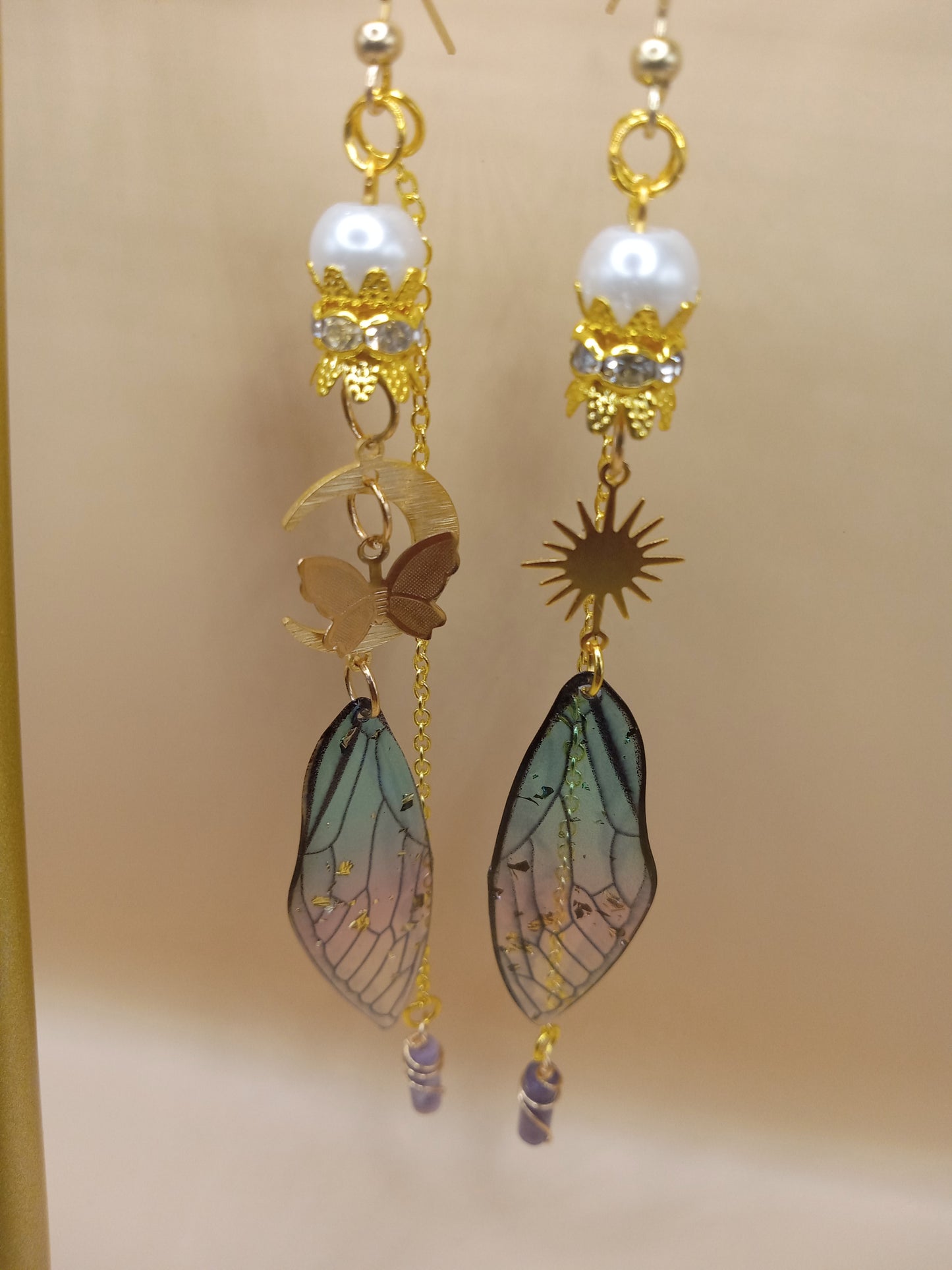 blue and violet fairy earrings by Sacred Moon Candle Co gold dangle with pearl sun and moon charms