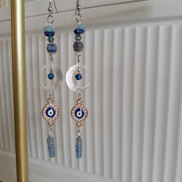 Sacred Moon Candle Co crescent moon evil eye earrings handcrafted silver crescents blue beads dangle