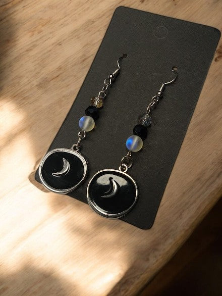 Sacred Moon Candle Co black moon medallion earrings with crescent design and bead details