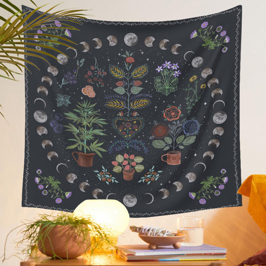 Sacred Moon Candle Co moon phase tapestry with floral and moon cycle designs hanging as wall decor