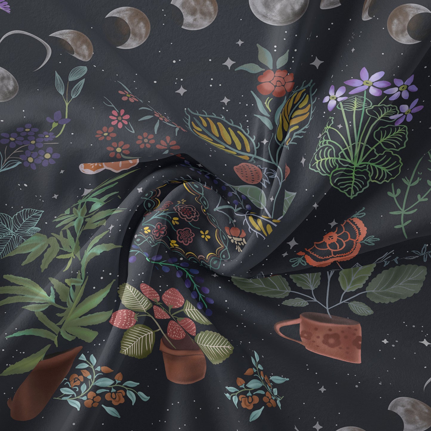 Sacred Moon Candle Co moon phase tapestry with floral and botanical designs on dark fabric wall decor