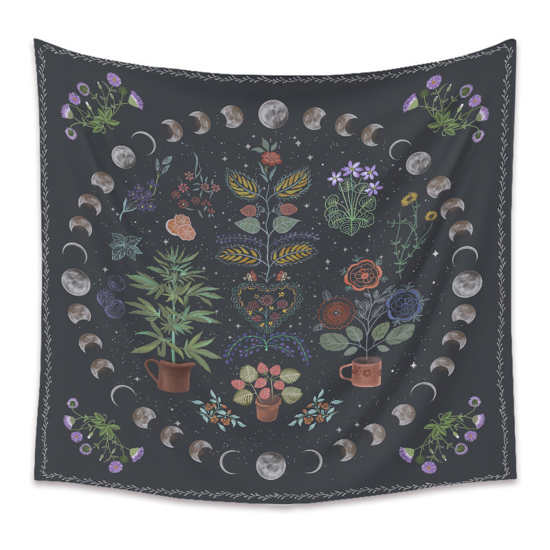 Sacred Moon Candle Co moon phase tapestry with floral and botanical designs on dark background