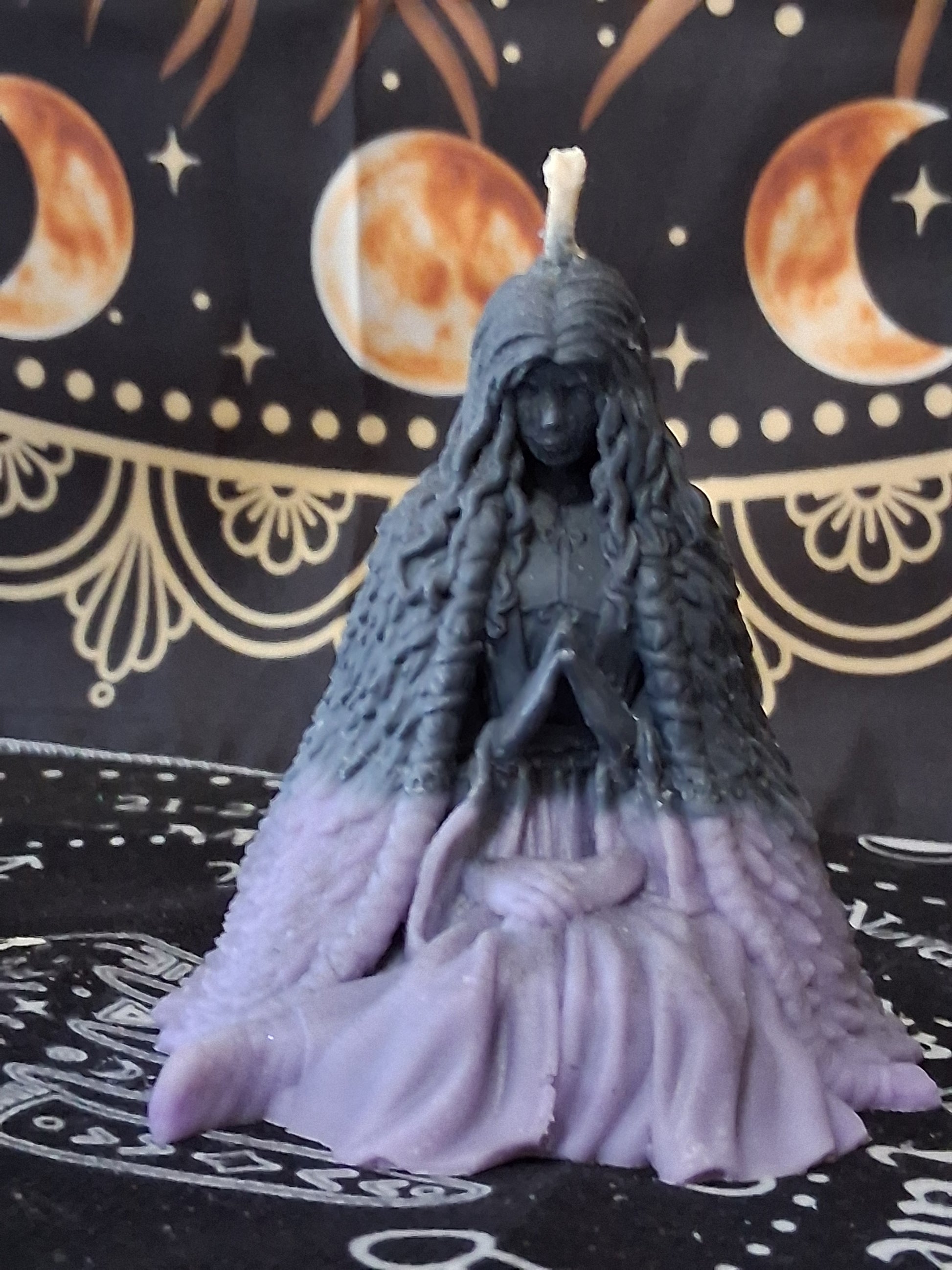 Sacred Moon Candle Co moon water bloom goddess ritual candle shaped like a meditating goddess figure