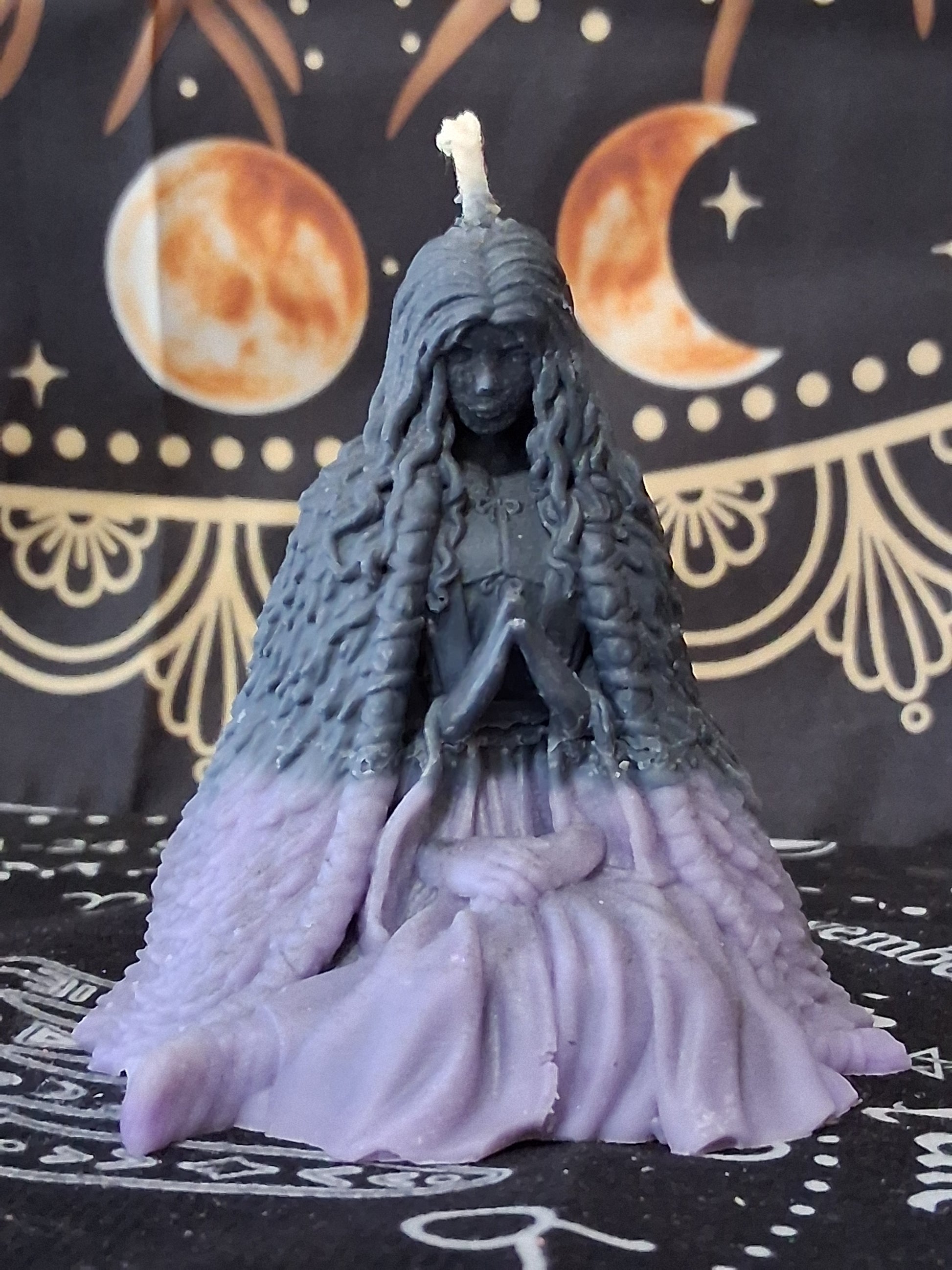 Sacred Moon Candle Co moon water bloom goddess ritual candle shaped like a seated woman with flowing hair