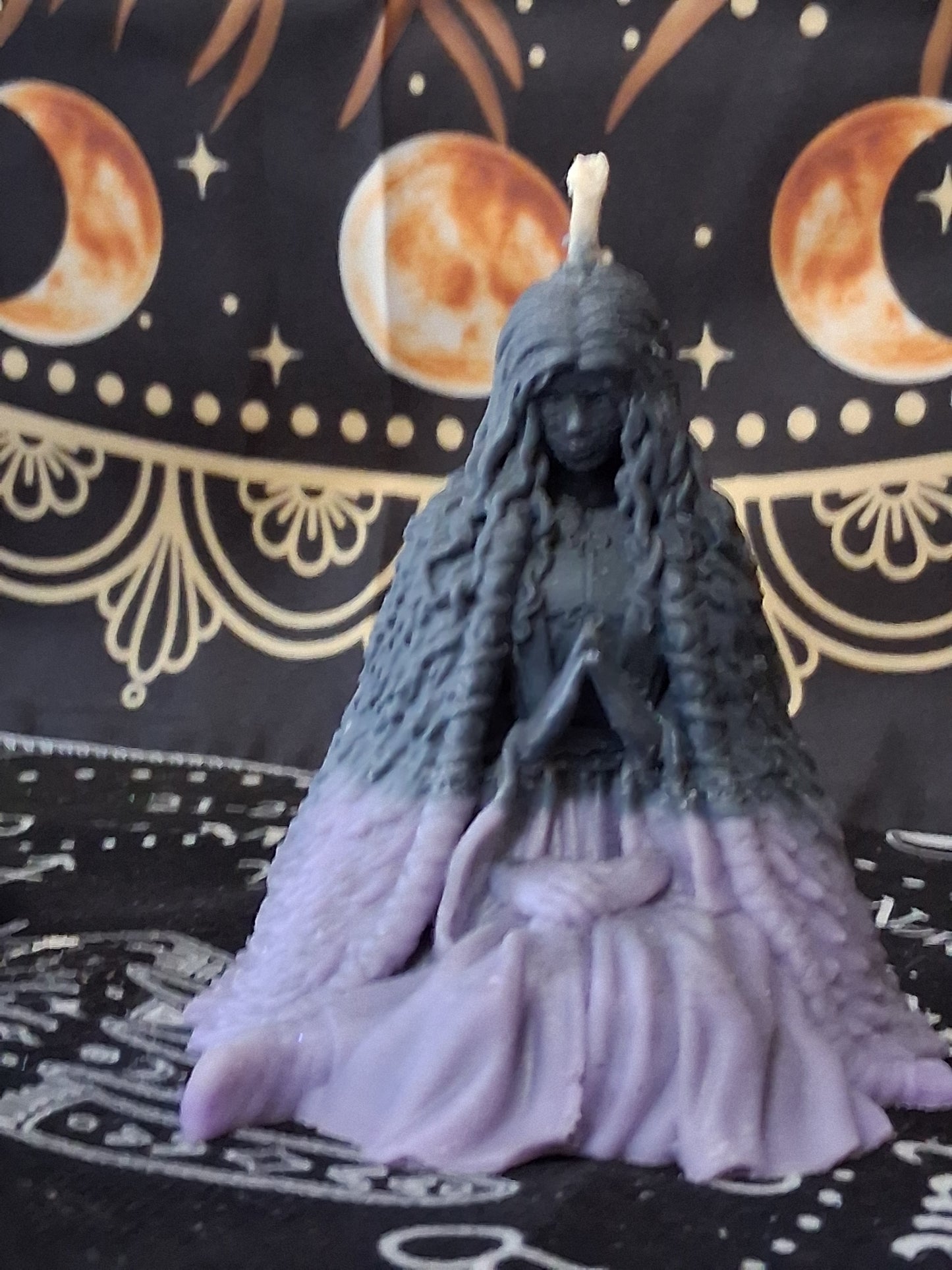 Sacred Moon Candle Co moon water bloom goddess ritual candle shaped like a seated goddess with detailed hair and dress