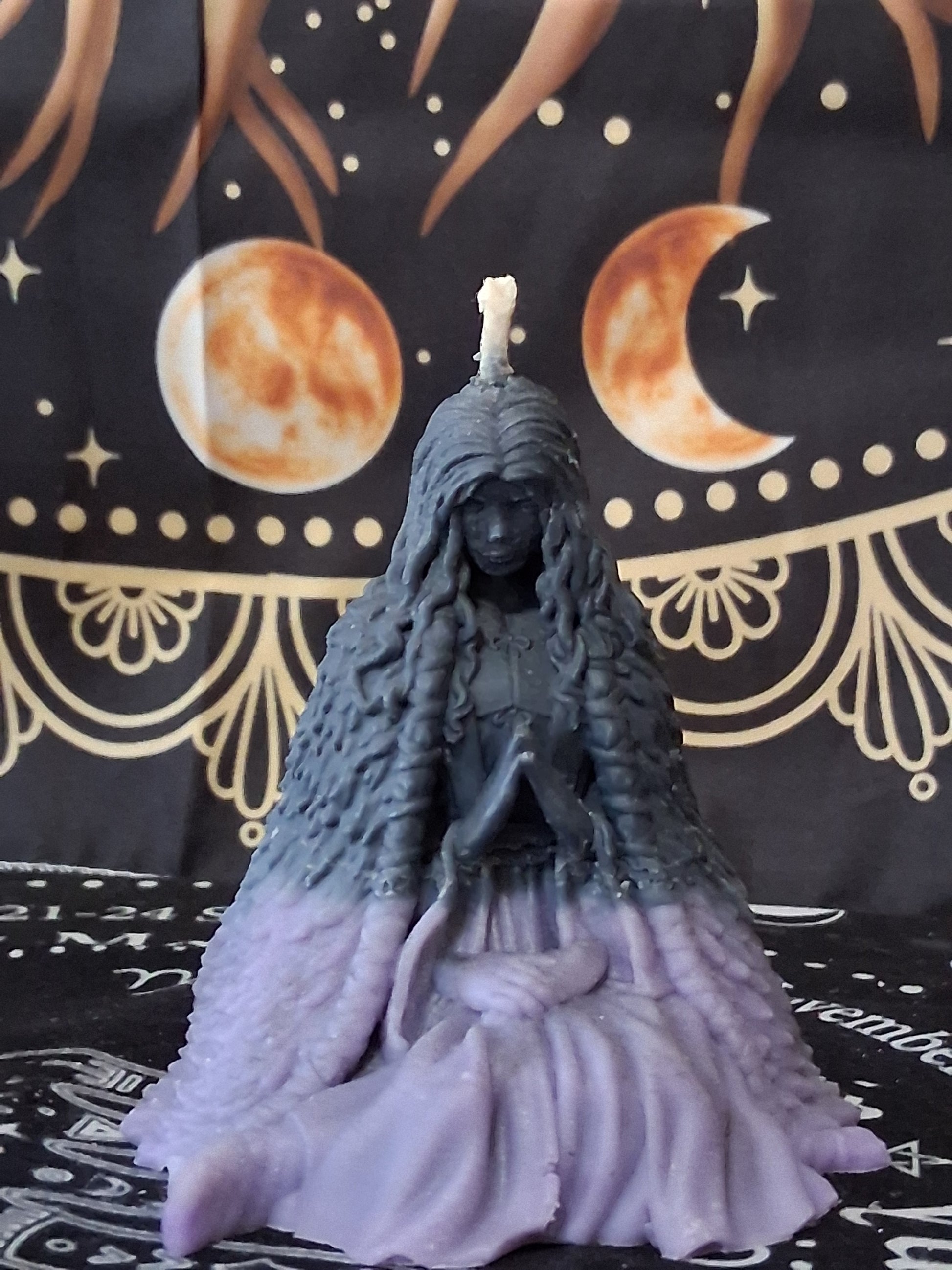 Sacred Moon Candle Co moon water bloom goddess ritual candle shaped like a seated goddess with flowing hair