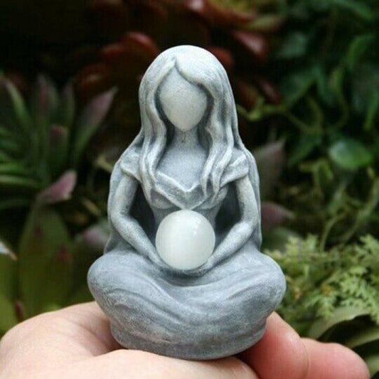 Faceless seated stone goddess statue holding white crystal orb for altar decor moon goddess alter figurine