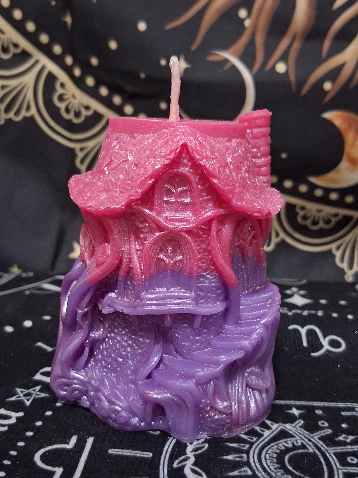 Sacred Moon Candle Co Nectar Nook Scented Treehouse Candle in pink and purple with intricate treehouse design