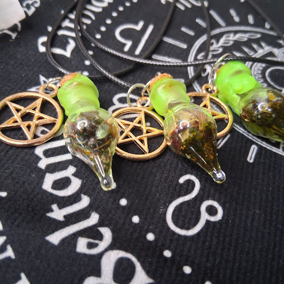 Prosperity spell bottle necklace with green glass vial and pentacle charm by Sacred Moon Candle Co